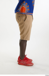 Kato Abimbo  1 beige shorts casual dressed flexing leg…